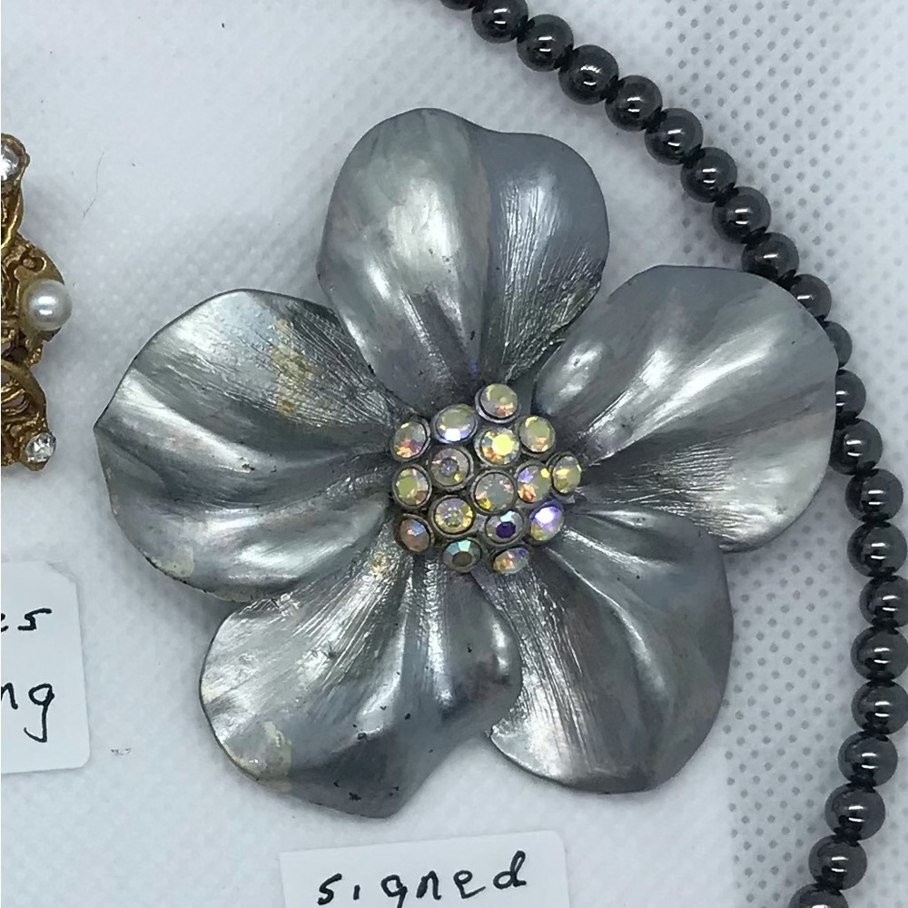Lot of vintage brooches, earrings and hematite necklace.